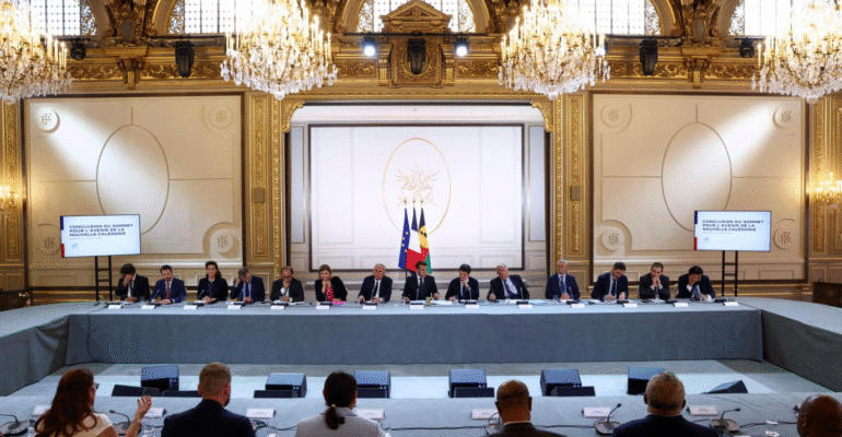 French President Macron, his officials, and the New Caledonian officials, July 2025, Tom Nicholson, photograph, AFP via Getty Images. Published in The Interpreter